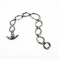 a sterling silver bracelet created to resemble beach pebbles by jewelry artist Michelle Hoting using the Mitsuro Hikime technique