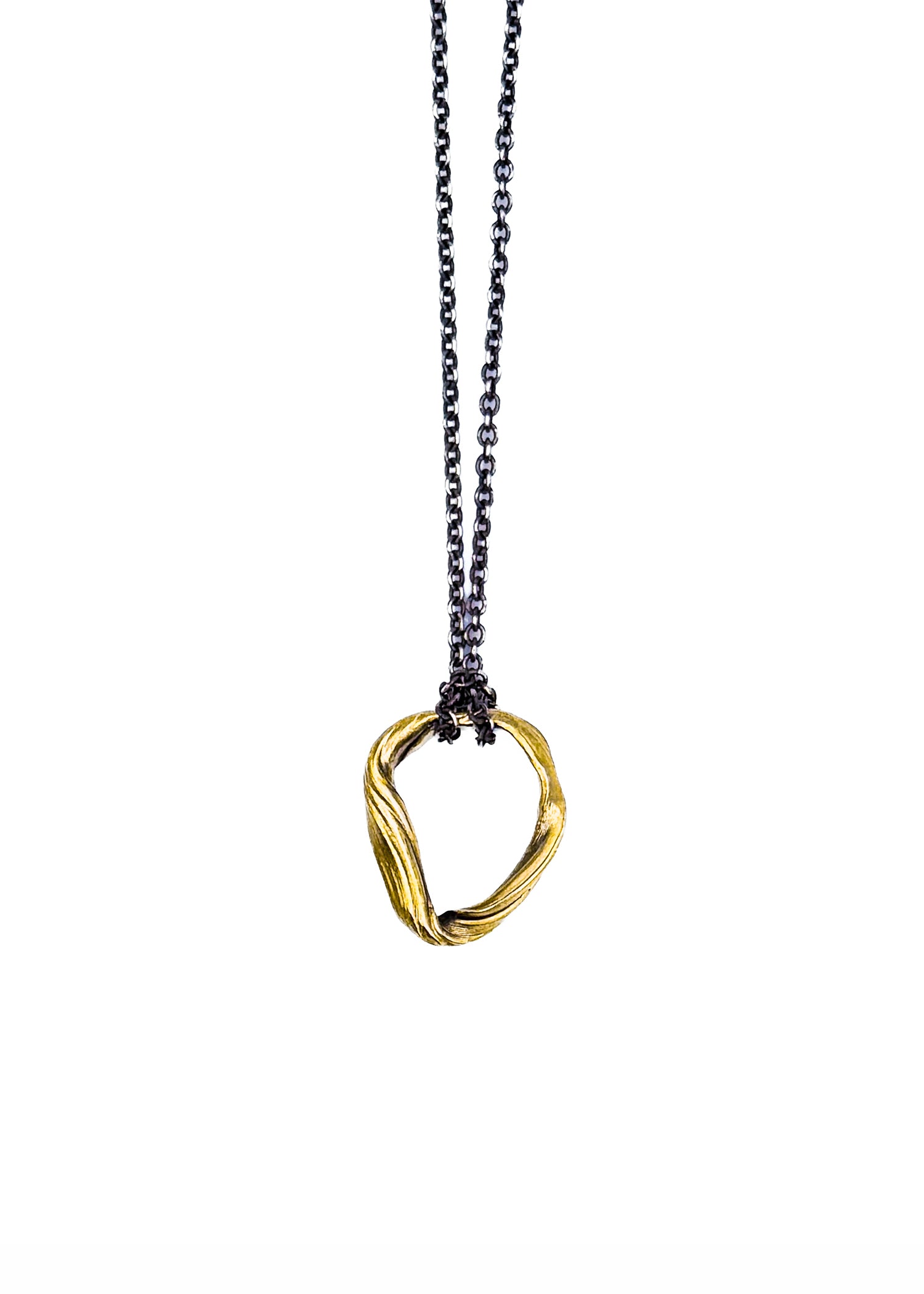 A sculptural 14k gold pendant made by jewelry artist Michelle Hoting using the Mitsuro Hikime art form.