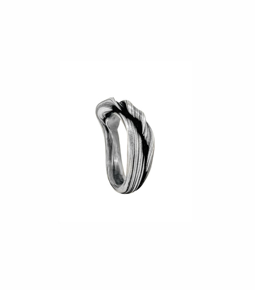 silver mitsuro hikime sculptural style ring by Michelle Hoting that resembles undulating canyon strata at antelope canyon